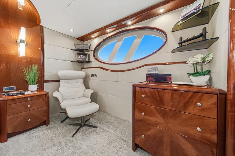 Slide: The Image of Luxurious interior of 2006 Lazzara 84 Flybridge yacht with elegant furnishings and modern decor. - 90