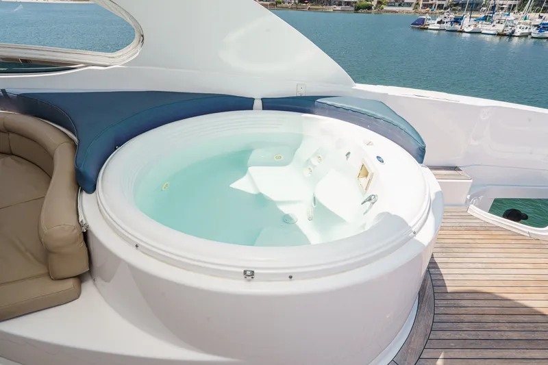 Slide: The Image of Luxurious jacuzzi on 2006 Lazzara 84 Flybridge yacht with ocean view. - 35
