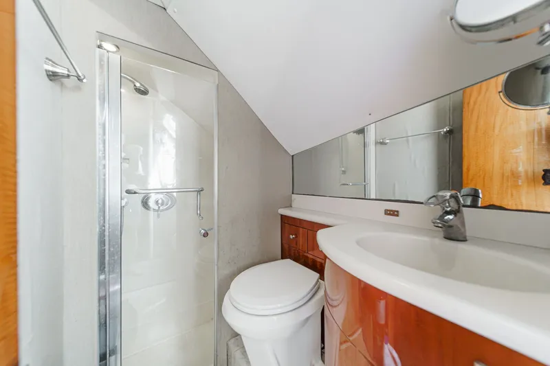 Slide: The Image of Luxurious bathroom in 2006 Lazzara 84 Flybridge yacht with modern fixtures and shower. - 96