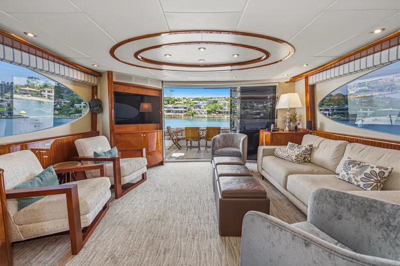 Slide: The Image of Luxurious interior of 2006 Lazzara 84 Flybridge yacht with elegant seating and scenic views. - 44