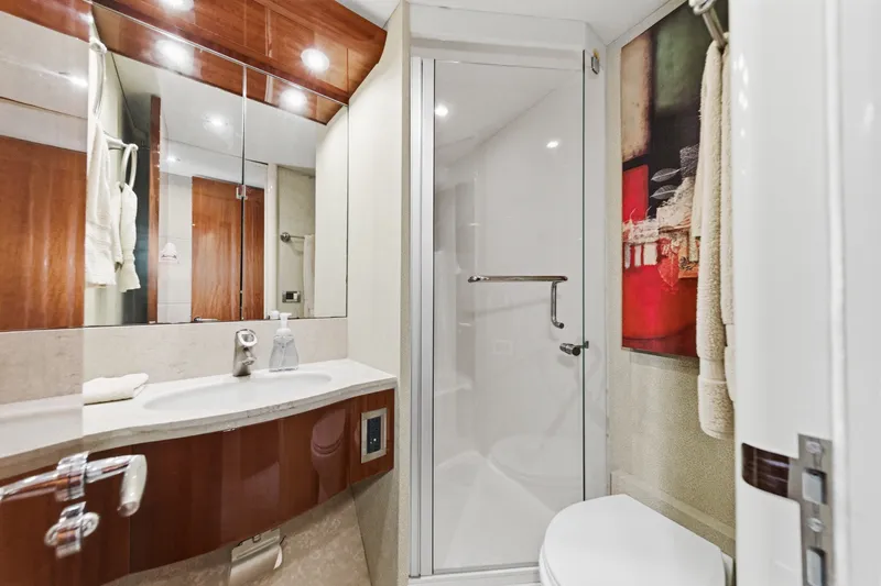 Slide: The Image of Luxurious bathroom in 2006 Lazzara 84 Flybridge yacht with modern fixtures and elegant design. - 67