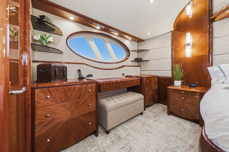 Slide: The Image of Luxurious cabin interior of 2006 Lazzara 84 Flybridge yacht with elegant wood furnishings. - 87
