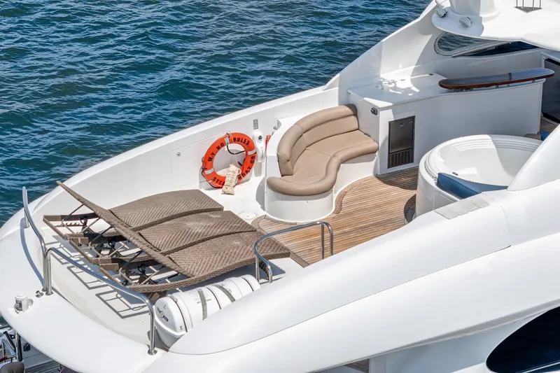 Slide: The Image of Luxurious 2006 Lazzara 84 Flybridge yacht deck with seating and ocean view. - 39