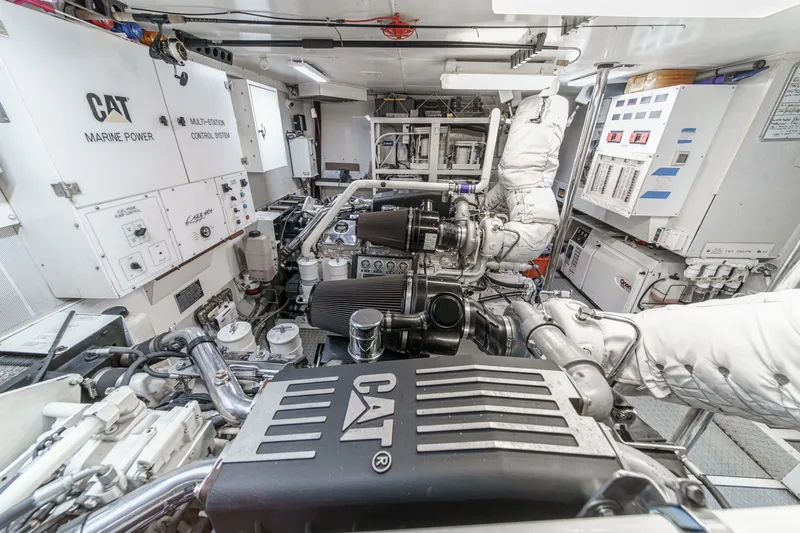 Slide: The Image of Engine room of 2006 Lazzara 84 Flybridge yacht with CAT marine power systems. - 101