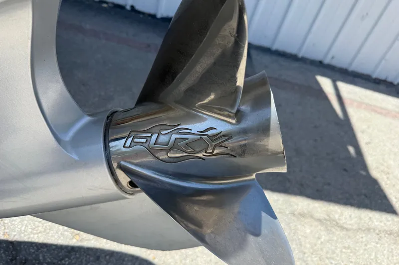 Slide: The Image of Close-up of a 2020 Ranger Z518 boat propeller with "Fury" branding. - 38