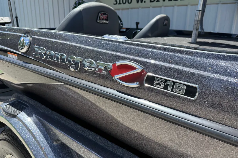 Slide: The Image of 2020 Ranger Z518 boat with metallic finish and logo detail. - 40