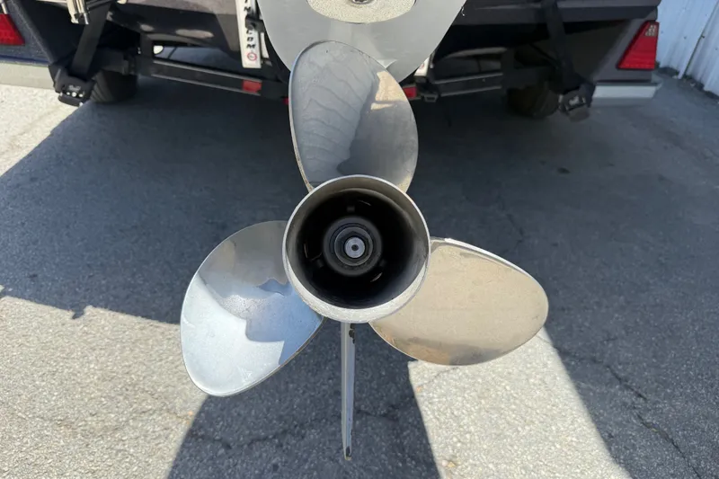 Slide: The Image of 2020 Ranger Z518 boat propeller on pavement background. - 37