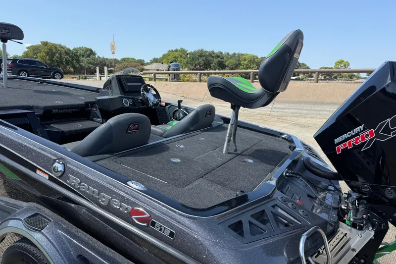 Slide: The Image of 2020 Ranger Z518 boat with Mercury Pro XS engine, parked outdoors. - 24