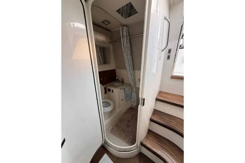 Slide: The Image of Interior bathroom of 2016 Boston Whaler 420 Outrage boat, featuring modern amenities. - 37