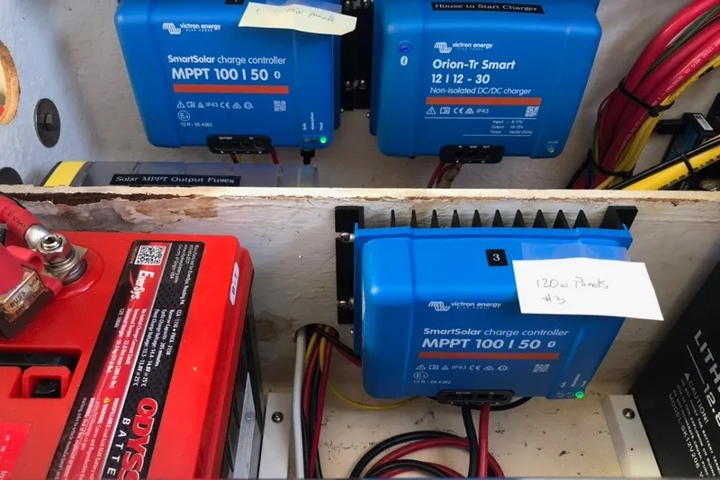 Slide: The Image of Electrical setup with Victron Energy charge controllers and Odyssey battery in a St Francis 44 yacht. - 41