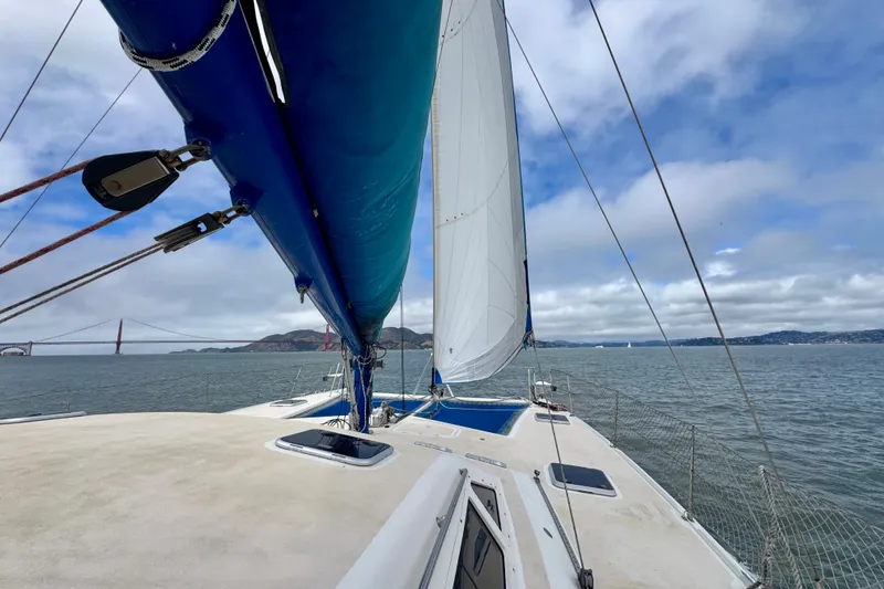 Slide: The Image of Sailing on a 2000 St Francis 44 catamaran near the Golden Gate Bridge under blue skies. - 59