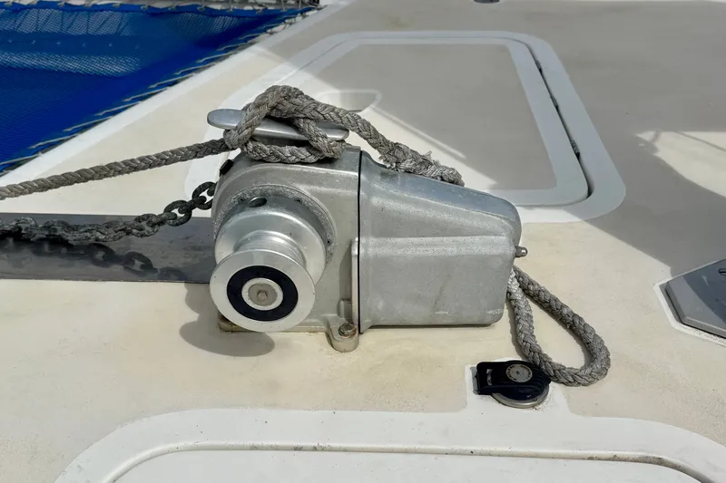 Slide: The Image of Anchor winch on 2000 St Francis 44 yacht deck with rope and chain. - 62