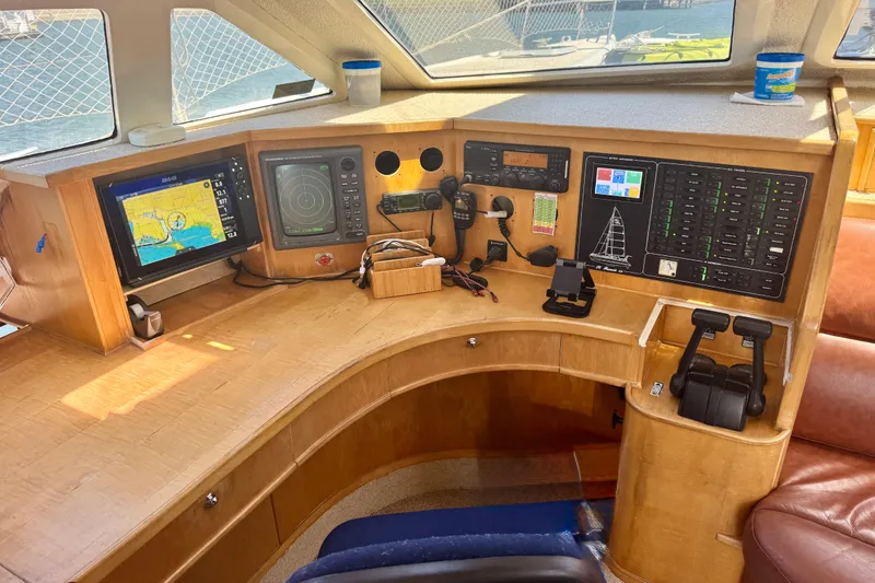 Slide: The Image of Navigation station of a 2000 St Francis 44 catamaran with modern instruments and controls. - 6