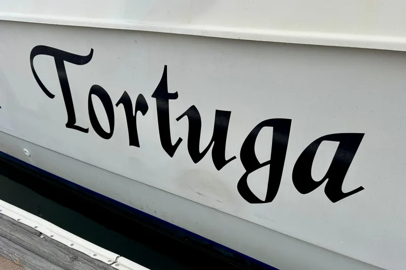 Slide: The Image of Side view of St Francis 44 boat named "Tortuga," built in 2000. - 3