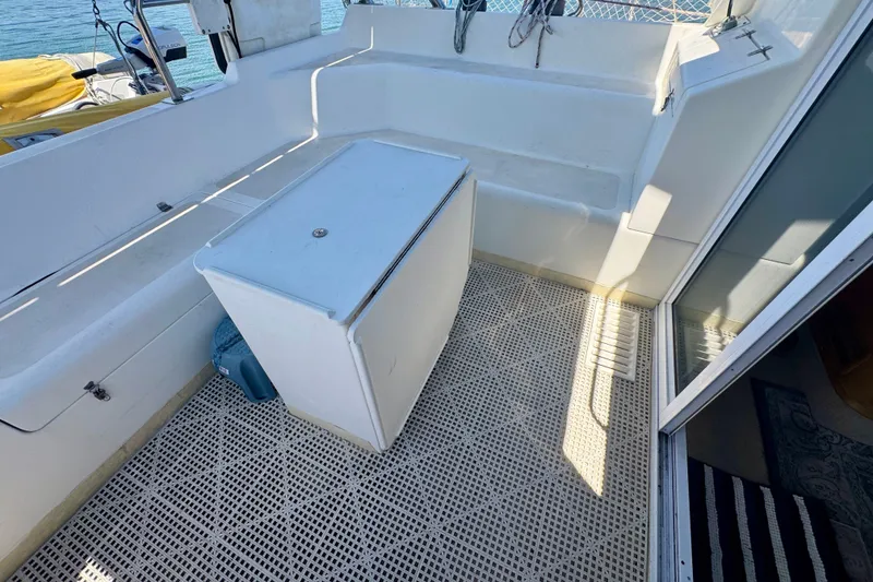 Slide: The Image of Spacious deck area on a 2000 St Francis 44 catamaran, featuring seating and storage. - 46