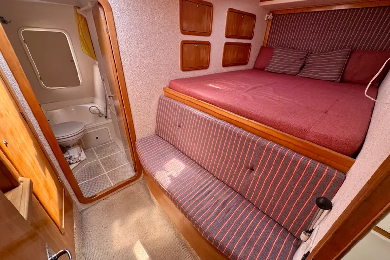 Slide: The Image of Cozy cabin interior of 2000 St Francis 44 yacht with bed and bathroom. - 20