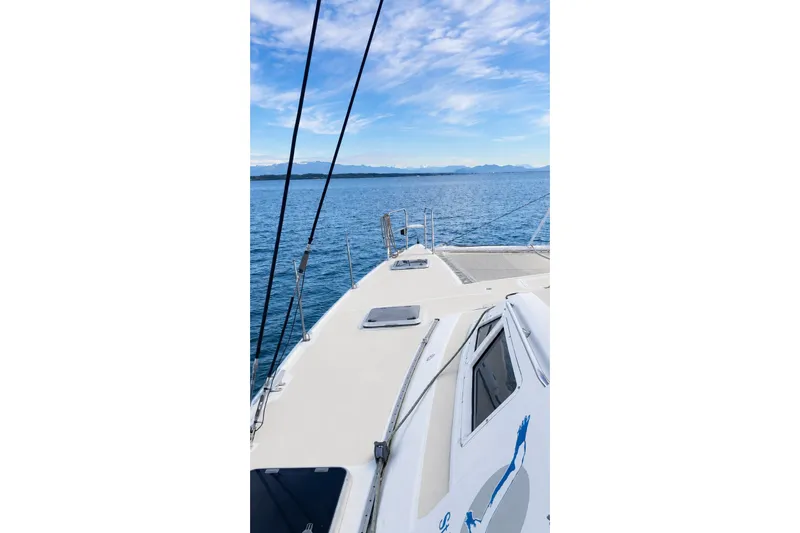 Slide: The Image of Sailing on a 2000 St Francis 44 catamaran, with ocean and mountain views. - 55