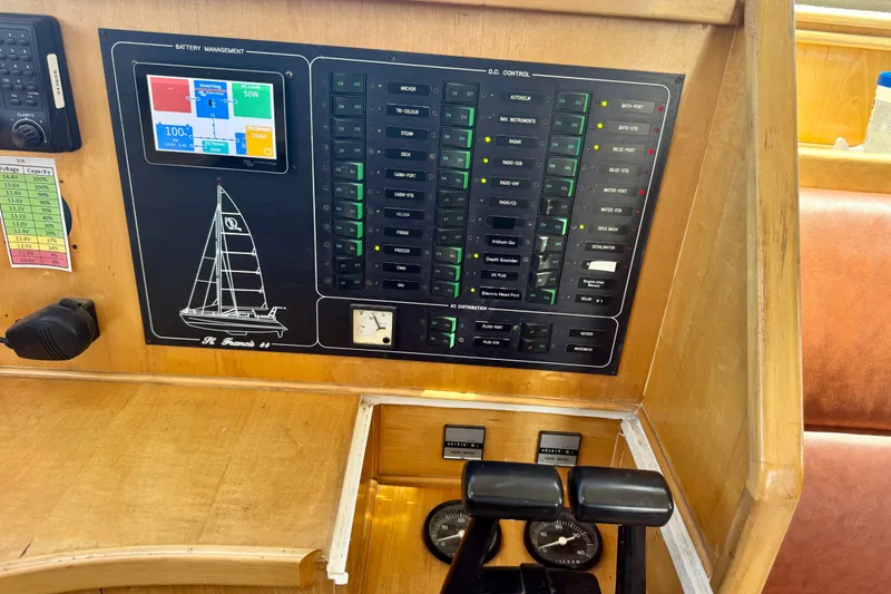 Slide: The Image of Control panel of a 2000 St Francis 44 yacht with battery management system. - 8