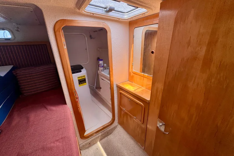 Slide: The Image of Interior of 2000 St Francis 44 yacht with cozy cabin and compact bathroom. - 30