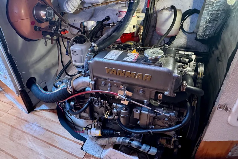 Slide: The Image of Engine compartment of a 2000 St Francis 44 yacht featuring a Yanmar engine. - 36