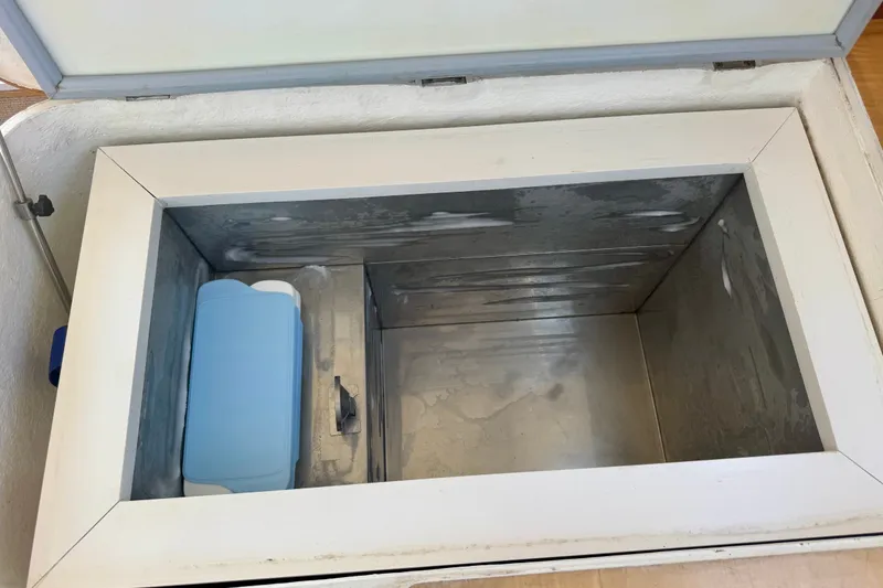 Slide: The Image of Open freezer compartment with a blue ice pack inside, St Francis 44 model, year 2000. - 15