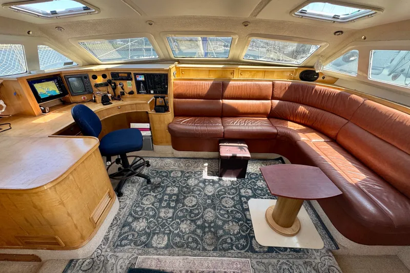 Slide: The Image of Luxurious interior of 2000 St Francis 44 yacht with leather seating and navigation equipment. - 11