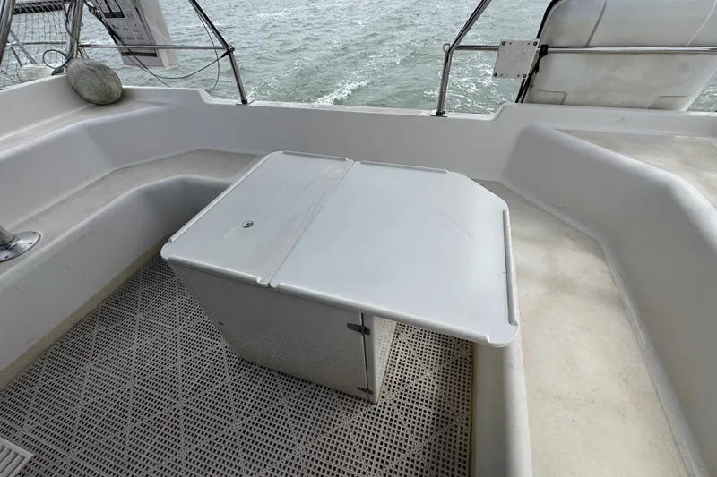 Slide: The Image of Spacious deck area on 2000 St Francis 44 catamaran with seating and table. - 50