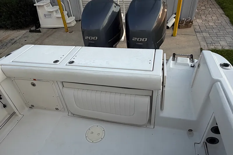 Slide: The Image of 2013 Robalo R260 Center Console boat with twin Yamaha 200 engines. - 28