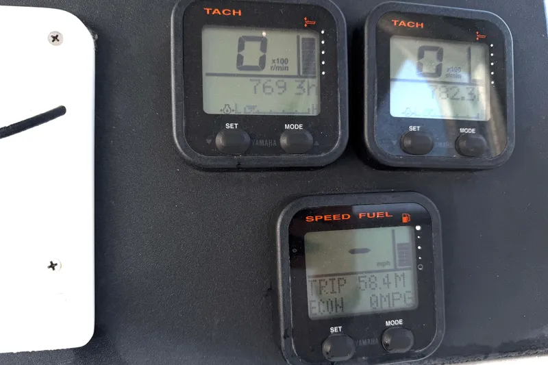 Slide: The Image of Dashboard of a 2013 Robalo R260 Center Console with Yamaha gauges. - 21