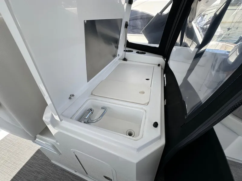 Slide: The Image of Sink next to grill both have covers - 26