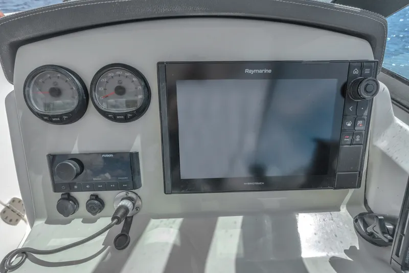 Slide: The Image of Dashboard of a 2018 Boston Whaler 230 Vantage with Raymarine electronics. - 25