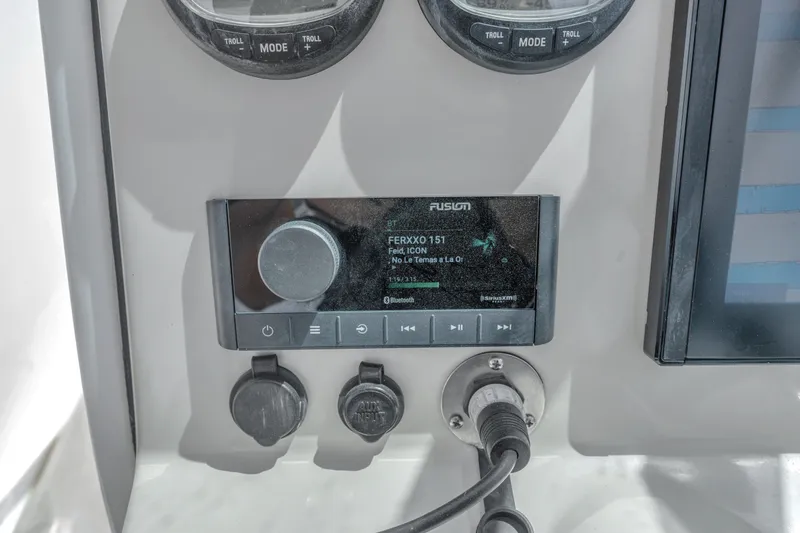 Slide: The Image of Fusion stereo system on 2018 Boston Whaler 230 Vantage boat dashboard. - 26