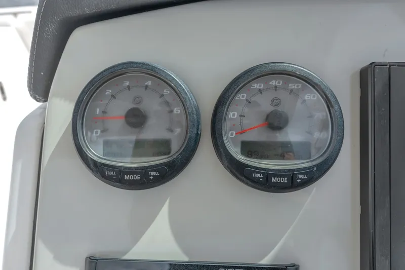 Slide: The Image of Dashboard gauges of a 2018 Boston Whaler 230 Vantage boat. - 29