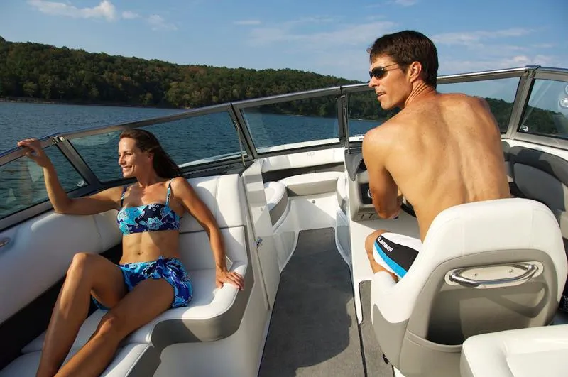 Slide: The Image of Manufacturer Provided Image: Couple enjoying a sunny day on a 2012 Cobalt 220 boat. - 25