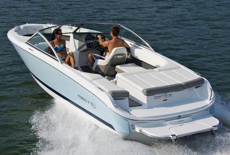The Image of Manufacturer Provided Image: 2012 Cobalt 220 boat cruising on water with two people onboard. - 21