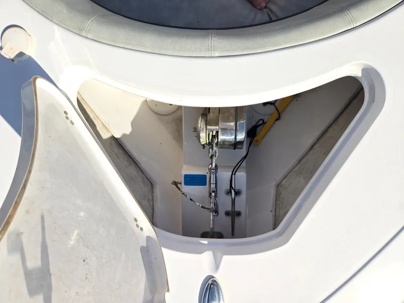 Slide: The Image of An anchor locker on a 2020 Sportsman Open 282TE Center Console boat. - 13