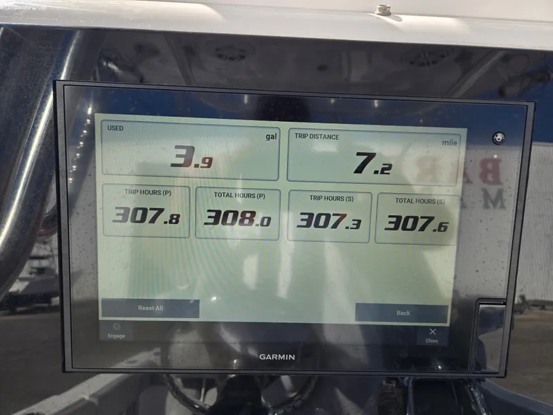 Slide: The Image of A Garmin screen displays fuel usage and trip distance for a Sportsman Open 282TE. - 6