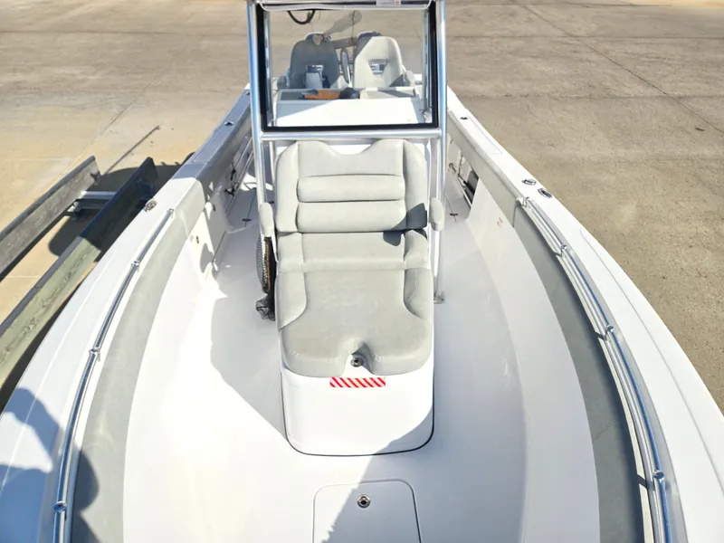 Slide: The Image of The image shows the bow of a 2020 Sportsman Open 282TE Center Console boat. - 12