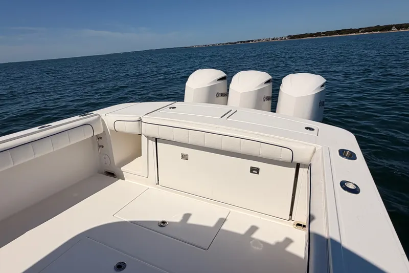 Slide: The Image of 2016 Regulator 34 boat with Yamaha engines on open water. - 15