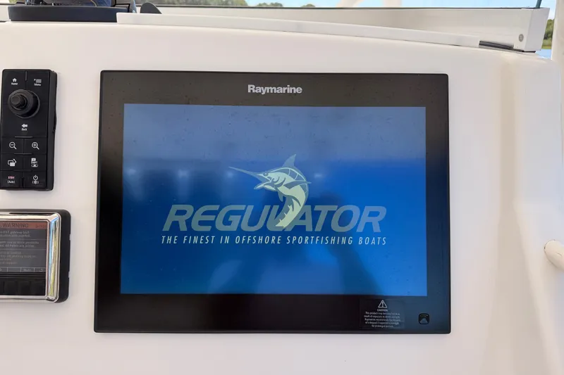 Slide: The Image of Raymarine display on 2016 Regulator 34 boat, showcasing offshore sportfishing branding. - 26