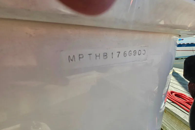 Slide: The Image of Hull identification number on 2000 Mainship 39 Trawler, dockside view. - 14