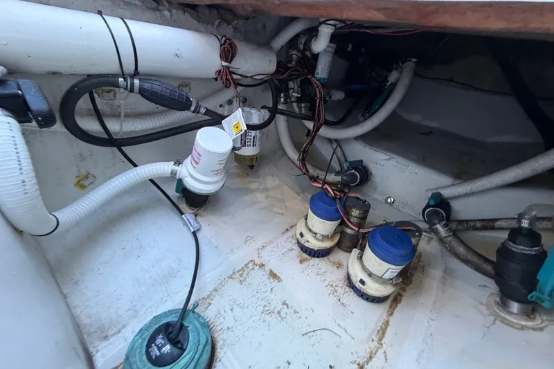 Slide: The Image of Bilge area of 2023 Sea Tech 33 boat with pumps and wiring. - 21