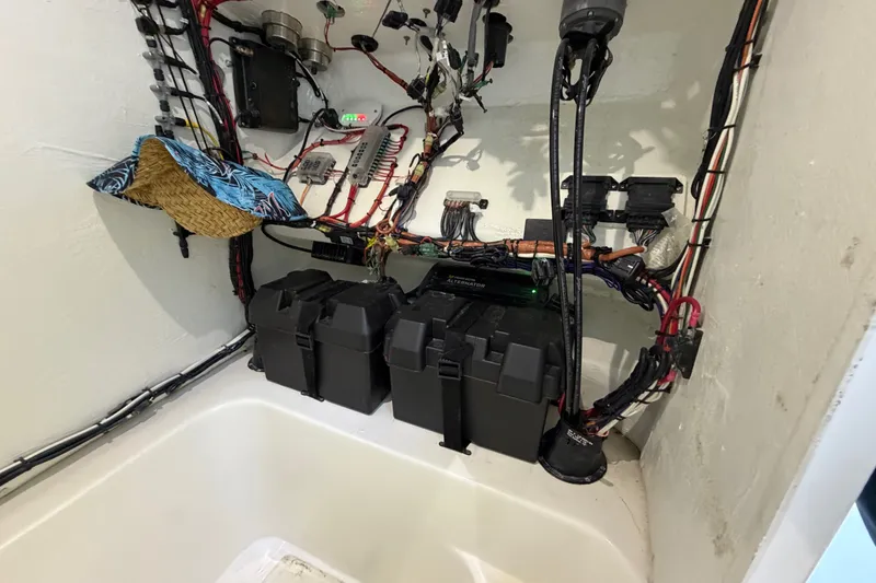 Slide: The Image of Electrical wiring and battery setup in a 2023 Sea Tech 33 boat. - 50