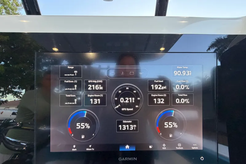 Slide: The Image of Dashboard of a 2023 Sea Tech 33 boat displaying navigation and engine data. - 45