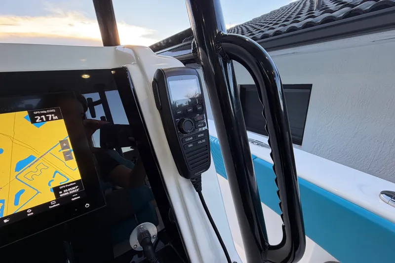 Slide: The Image of 2023 Sea Tech 33 boat dashboard with GPS and communication device. - 44