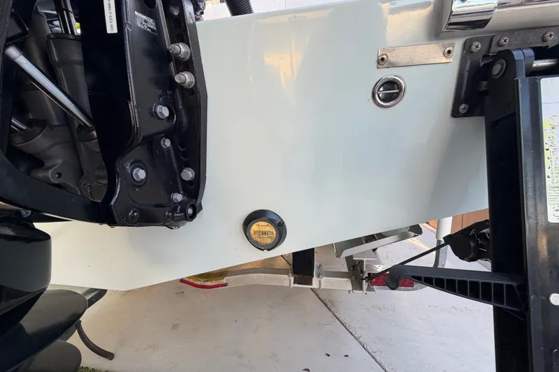 Slide: The Image of Close-up of a 2023 Sea Tech 33 boat's engine and transom details. - 8