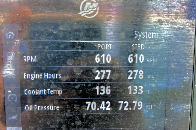 Slide: The Image of Display screen showing engine metrics for 2022 Blackfin 252 DC boat. - 18
