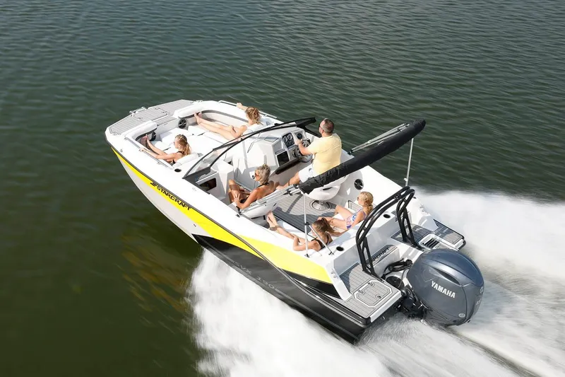 Slide: The Image of Manufacturer Provided Image: 2026 Starcraft SVX 190 DC OB boat cruising on water with passengers enjoying the ride. - 1