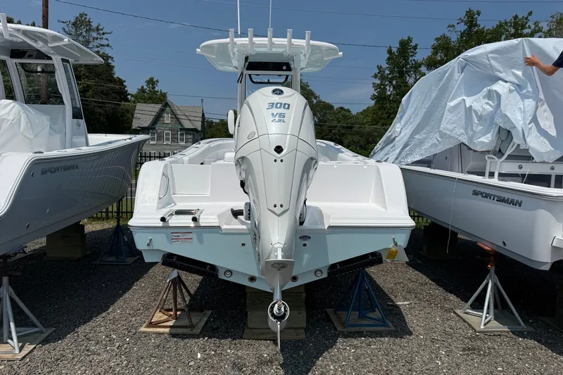 Slide: The Image of 2027 Sportsman Open 232 Center Console boat with powerful 300 V6 engine on display. - 13
