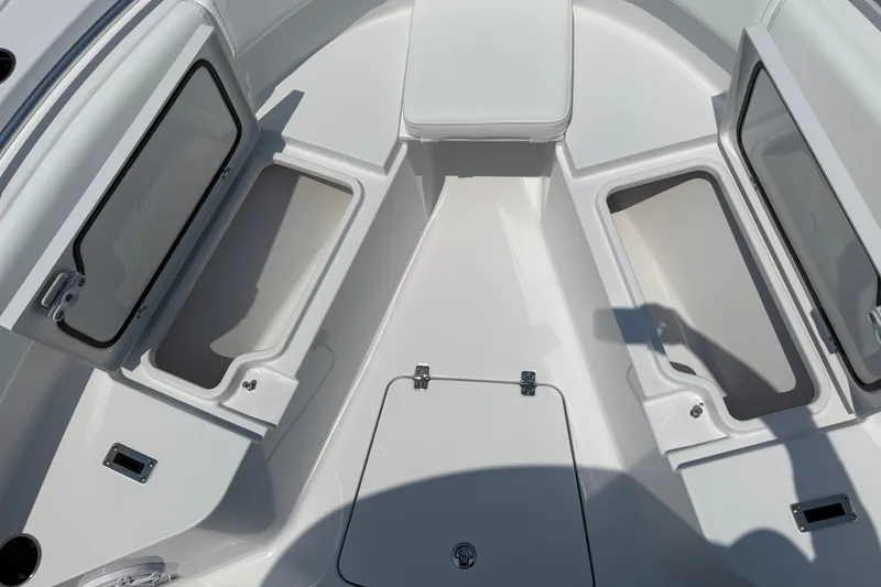 Slide: The Image of 2027 Sportsman Open 232 Center Console boat interior with open storage compartments. - 3